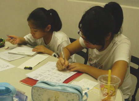 Maryknoll students learn
            English at Impact Language